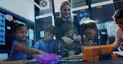 Teacher Guiding Students with Digital Learning Technologies - Download Free Stock Images Pikwizard.com