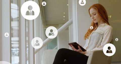 Businesswoman Analyzing Data with Digital Icons in Modern Office