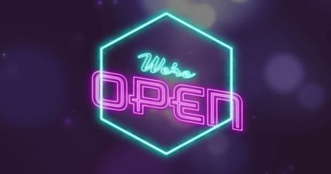 We are open electric neon sign in dimly lit atmosphere