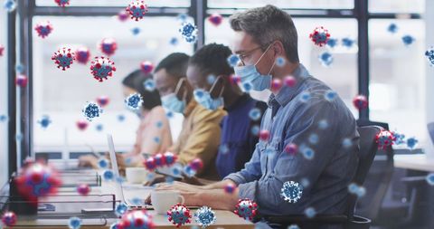 Office Workers Wearing Masks Surrounded by Digital Virus Cells