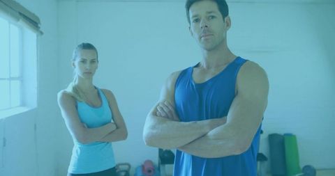 Confident Trainers in Fitness Studio with Workout Equipment