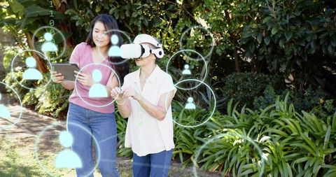 Caregiver guiding senior through virtual reality garden with social augmented overlays