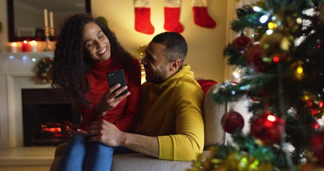 Happy Couple Enjoying Christmas Eve by the Fireplace - Download Free Stock Images Pikwizard.com