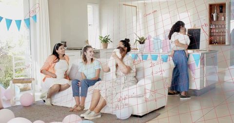 Friends celebrating pastel baby shower at home with newborns, gifts and joyful gatherings