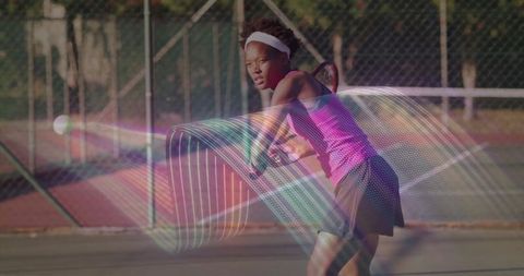 Focused Female Tennis Player with Racket Blur on Court