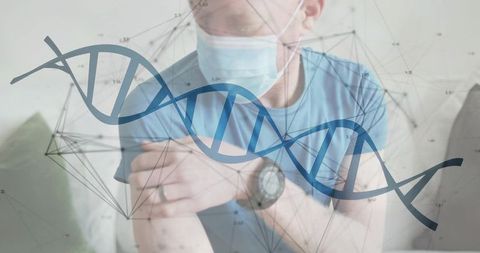 Patient in mask holding arm with dna helix projection