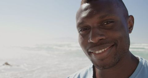 African American Volunteer Smiling at Beach - Download Free Stock Images Pikwizard.com