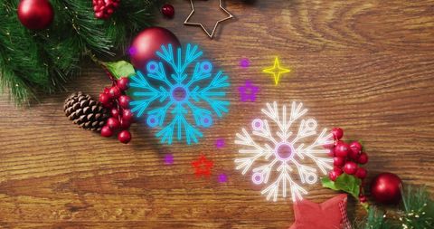 Festive Christmas Decorations with Neon Snowflakes on Wooden Table - Download Free Stock Images Pikwizard.com