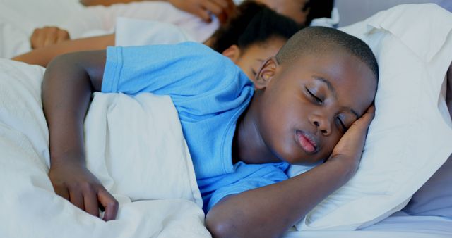 Peaceful African American Child Sleeping in Bed - Download Free Stock Images Pikwizard.com