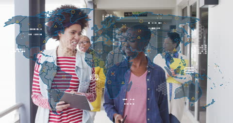 Diverse Business Team Collaborating with Global Technology Interface