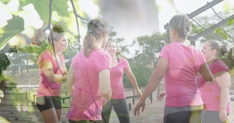 Team bonding on outdoor obstacle course with nature vibes