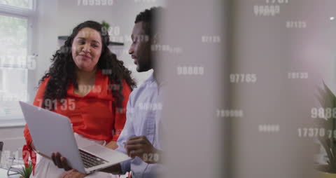 Diverse Business Team Collaborating with Data Flow