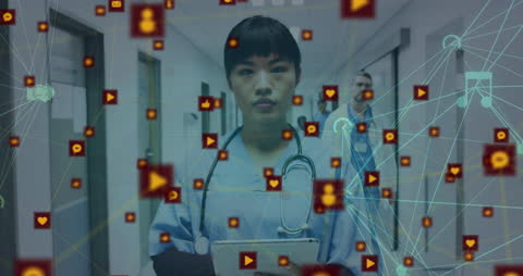 Asian Female Doctor Using Tablet with Digital Network Connections