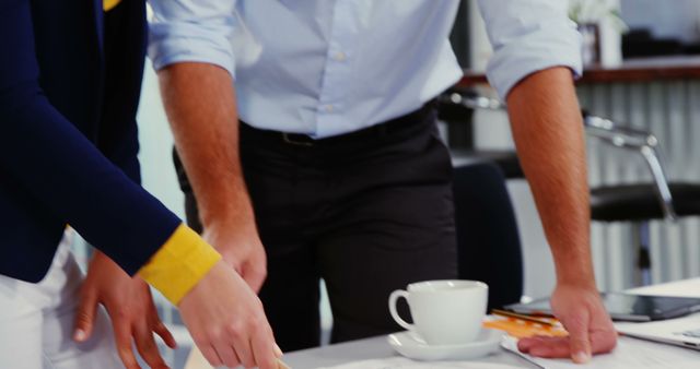 Business Professionals Analyzing Documents in Office Meeting - Download Free Stock Images Pikwizard.com