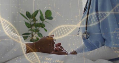 Nurse holding patient hands at bedside with dna overlay conveying compassionate care