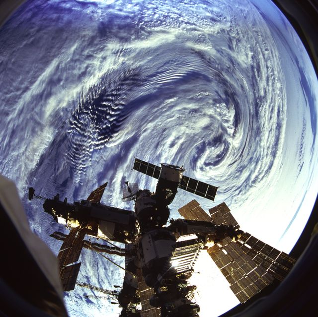STS079-817-034 (16-26 Sept. 1996) --- The Russian Mir Space Station is backdropped over a storm in the Roaring 40's near Heard Island in the south Indian Ocean. This photograph is one of four 70mm frames (along with fifteen 35mm frames) of still photography documenting the activities of NASA's STS-79 mission, which began with a Sept. 16, 1996, liftoff from Launch Pad 39A the Kennedy Space Center (KSC) and ended with a landing at KSC on Sept. 26, 1996.  Onboard for the launch were astronauts William F. Readdy, commander; Terrence W. Wilcutt, pilot; John E. Blaha, Jerome (Jay) Apt, Thomas D. Akers and Carl E. Walz, all mission specialists.  On flight day 4, the crew docked with Russia's Mir Space Station.  Shannon W. Lucid, who had spent six months aboard Mir, switched cosmonaut guest researcher roles with Blaha.  The latter joined fellow Mir-22 crewmembers Valeri G. Korzun, commander, and Aleksandr Y. Kaleri, flight engineer.
