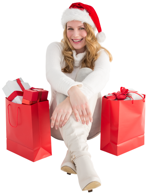 Cheerful Woman in Santa Hat Sitting with Red Gift Bags on Transparent Background - Download Free Stock Videos Pikwizard.com