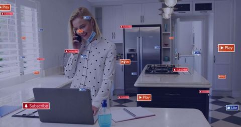 Woman engaged in remote work in modern kitchen
