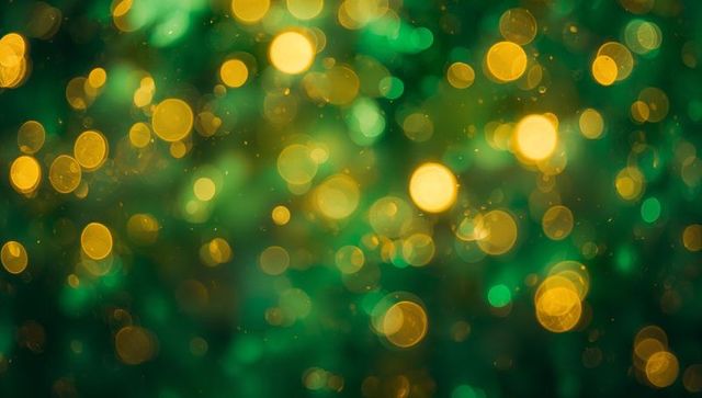 Emerald and gold bokeh lights creating soft festive glow with layered depth