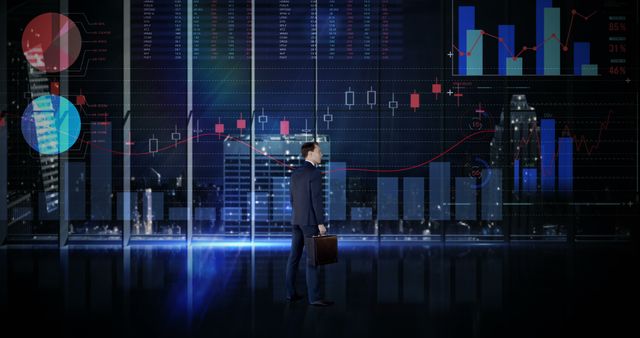 Businessman Analyzing Data Visualizations in Modern Office at Night - Download Free Stock Images Pikwizard.com