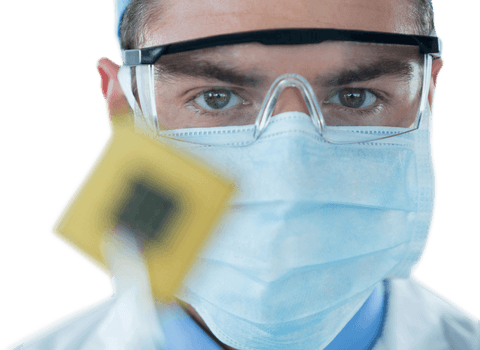Healthcare professional holding electronic chip with transparent mask and glasses