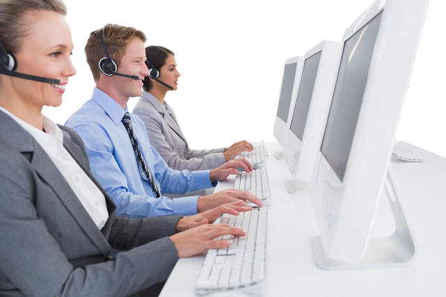 Transparent Team of Call Center Representatives Using Computers and Headsets - Download Free Stock Videos Pikwizard.com