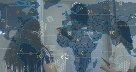 Female executive leading team at glass wall with global map overlay for data strategy