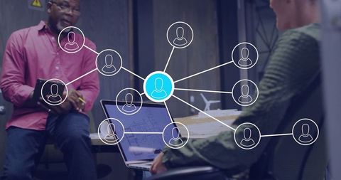 Colleagues collaborating on innovative architecture with network technology