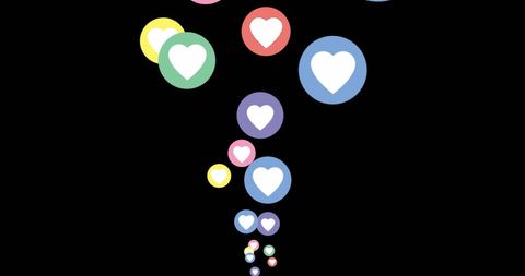 Vibrant social media heart reaction icons floating on black