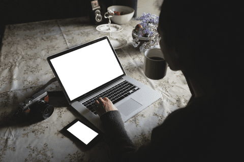 transparent screen laptop with coffee at cozy table setting - Download Free Stock Videos Pikwizard.com