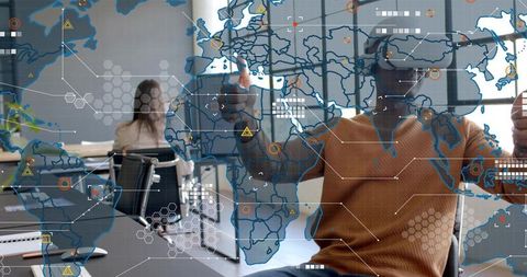 Man wearing VR headset gesturing at holographic world map in modern office collaboration