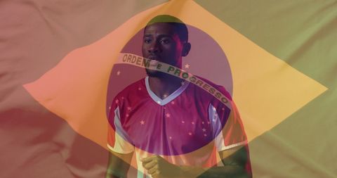 Soccer Player in Brazil Jersey Celebrating with Flag