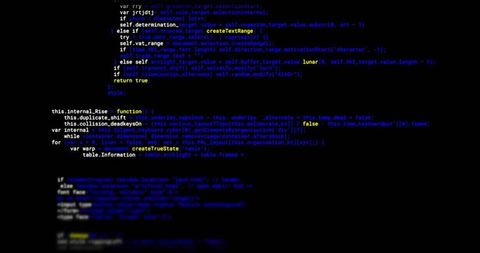 Code editor close-up with colored syntax and shallow depth of field on dark monitor