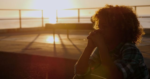 Pensive Woman Contemplating Life During Sunset By Beach - Download Free Stock Images Pikwizard.com