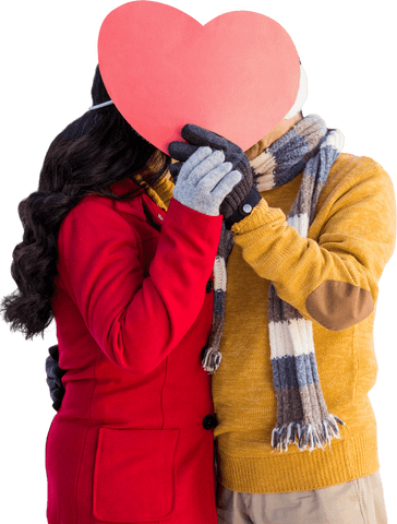 Transparent couple hiding kiss behind heart on cold winter day