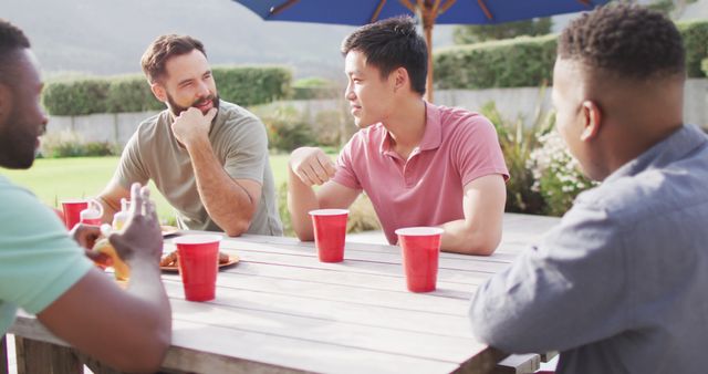 Diverse Friends Relaxing Outdoor with Drinks around Table - Download Free Stock Images Pikwizard.com