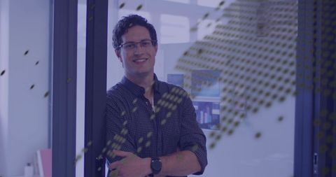 Businessman Overseeing Financial Data in Modern Office