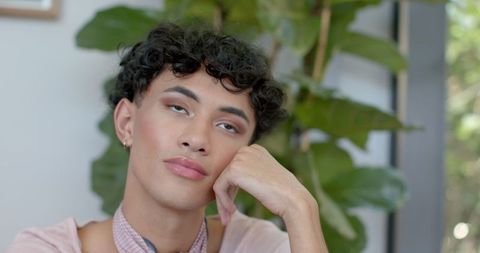 Young man resting in modern lounge interior