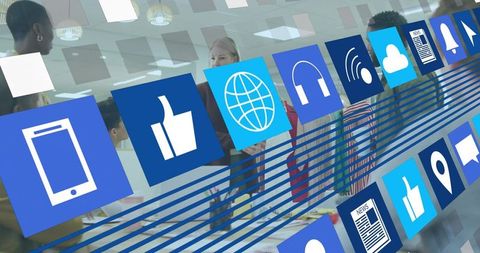 Business Team Collaborating at Conference Table with Floating Digital Icons and Analytics