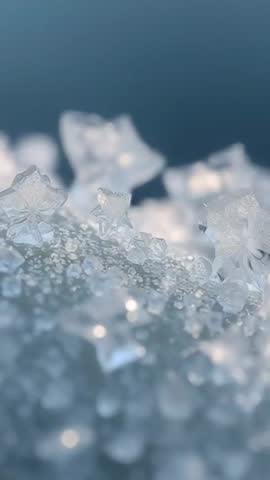 Shifting Macro Vertical Video Focusing on Star-Shaped Ice Crystals with Frost Facets and Blue Bokeh