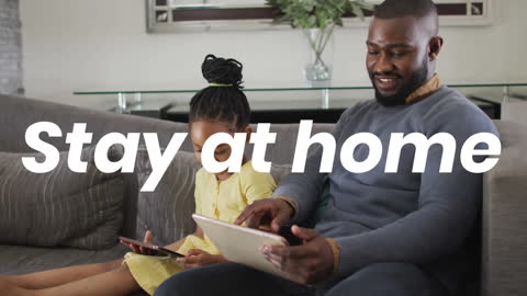 Father and Daughter Quality Time with Tablets at Home