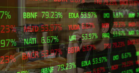 Businessman Analyzing Stock Market Data on Phone