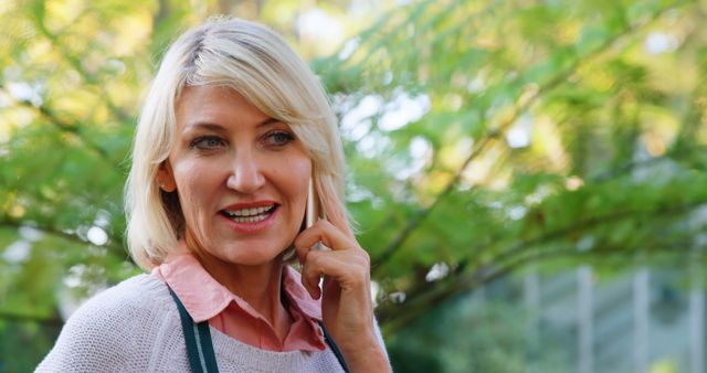 Senior Woman Enjoying Gardening Outdoors in Summer - Download Free Stock Images Pikwizard.com