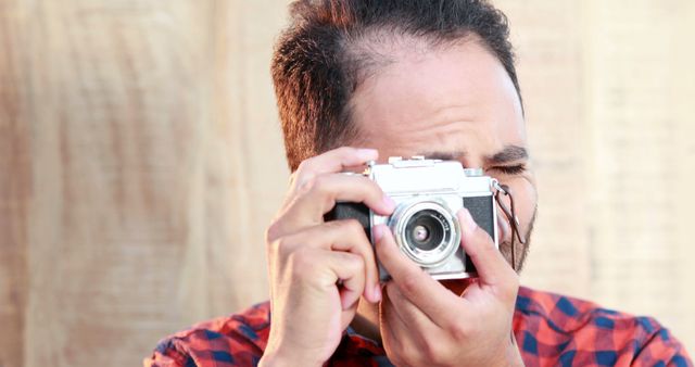 Man Shooting Photo with Vintage Camera, Creative Photography Concept - Download Free Stock Images Pikwizard.com