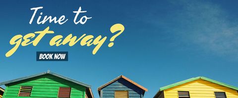 Colorful Beach Huts Against Clear Blue Sky Inspiring Relaxation