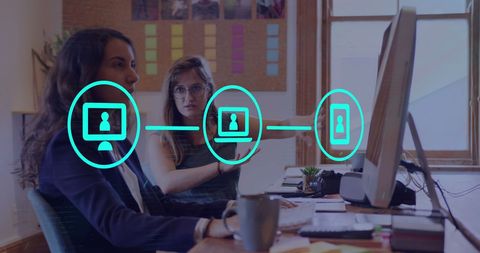 Diverse business professionals in an office demonstrating collaboration and interconnectedness, highlighted by digital connection icons. This represents modern digital communication and global teamwork, suitable for corporate presentations, tech-driven marketing content, and illustrating teamwork dynamics.