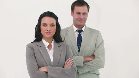 Confident Business Team Wearing Headset Smiling at Camera