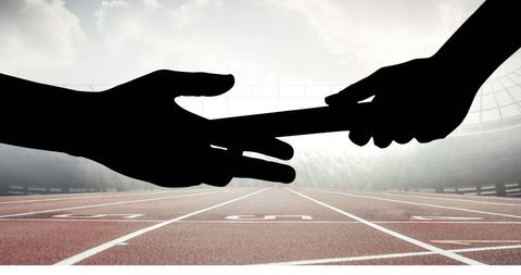 Silhouetted Relay Race Baton Exchange with Empty Track - Download Free Stock Images Pikwizard.com