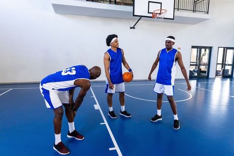Basketball team practice session on indoor court
