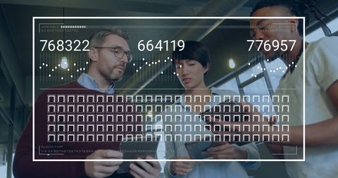 Diverse Team Analyzing Data with Digital Projection